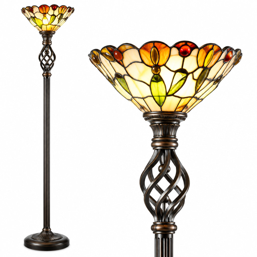 A traditional floor lamp with a black metal frame and a multi-colored stained glass shade featuring yellow, orange, and blue tones.
