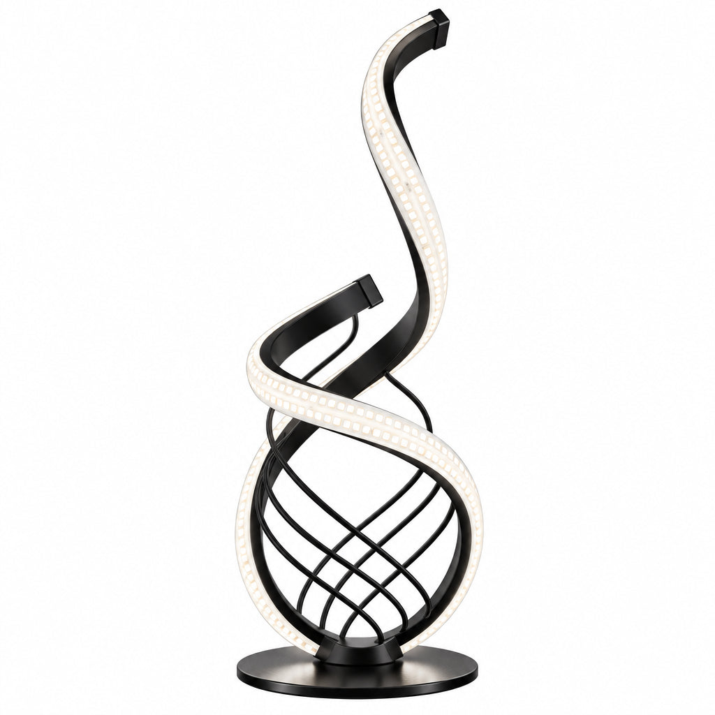A modern spiral LED table lamp with a black metal frame and glowing white light strip, placed on a wooden table next to a glass bottle and a teacup in a warm indoor setting.